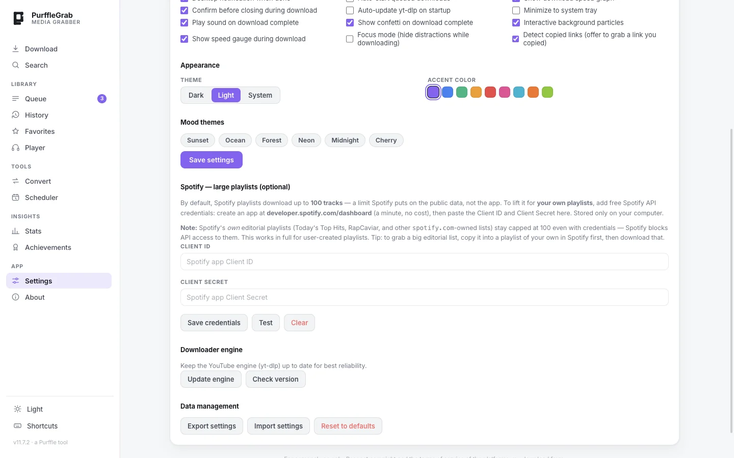 Settings — theme, accent colours, mood themes, Spotify API key and downloader engine update